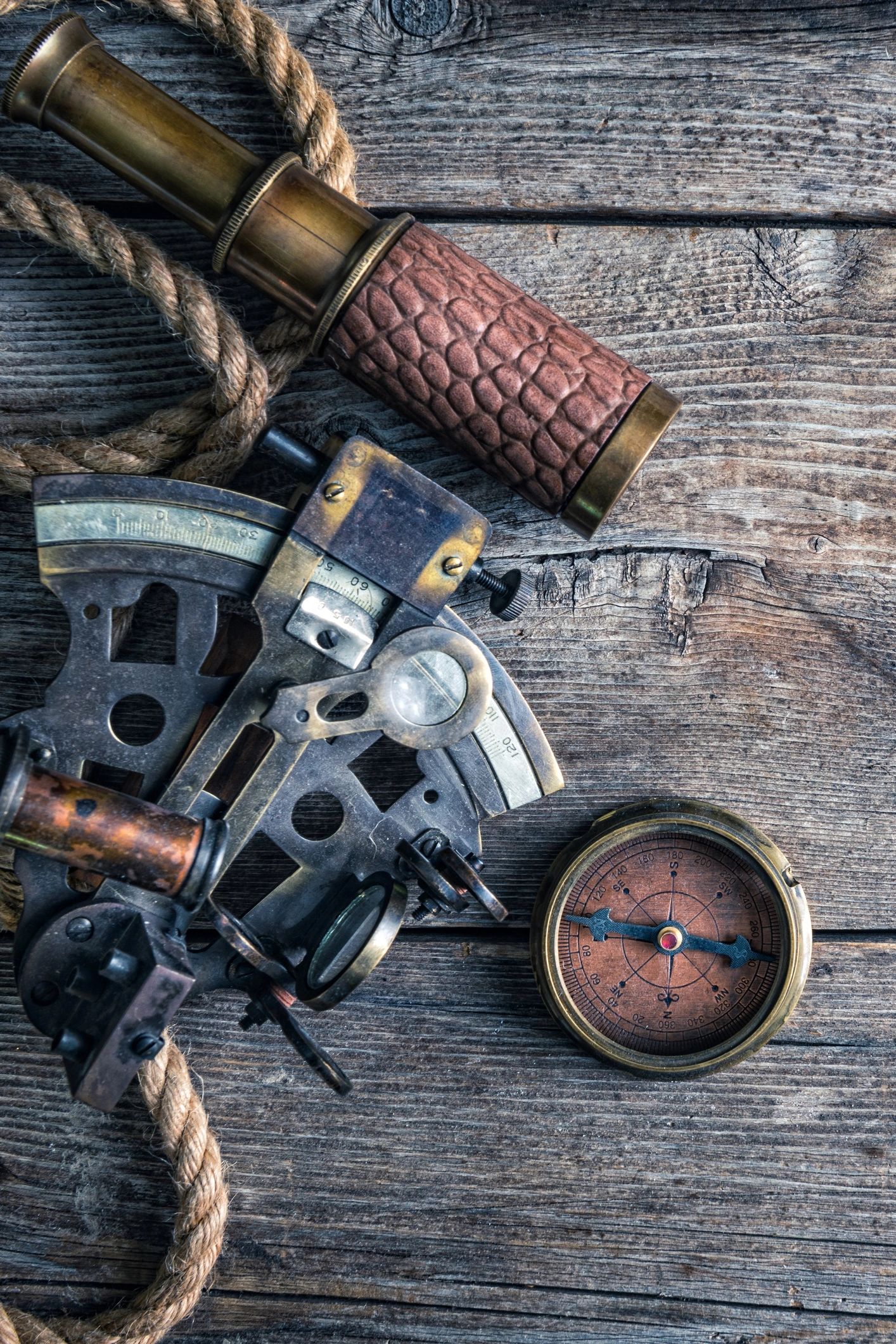 Nautical equipment on the wooden background